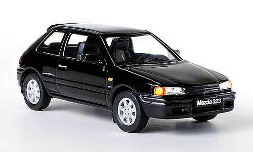 Mazda 323 GTX 1/43 IXO negro LHD 1989 coche miniatura