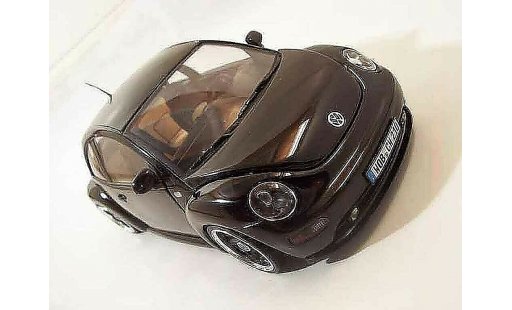 Volkswagen New Beetle Base 1/18 Solido men in black coche miniatura