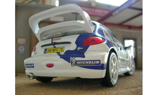 Peugeot 206 WRC 1/18 Solido 1999 # 15 Clarion Panizzi blanco coche miniatura