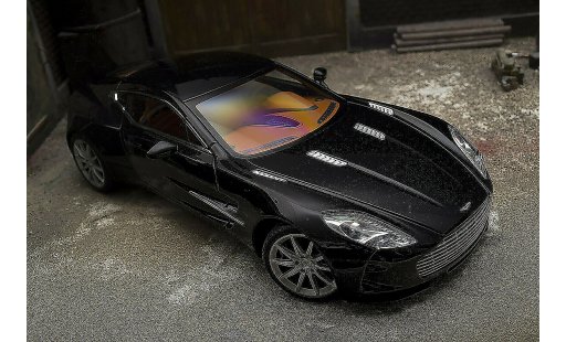 Aston Martin One-77 coupe 1/18 Autoart 77 negro pearl interieur naranja coche miniatura