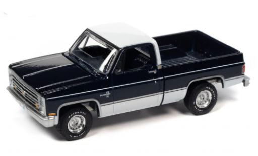 Coche miniatura Chevrolet Silverado 1/64 Auto World 10 Fleetside azul foncé/blanche 1985 Chevrolet Silverado 1/64 Auto World 10 Fleetside azul foncé/blanche 1985 coche miniatura