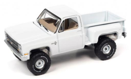 Coche miniatura Chevrolet Silverado 1/64 Auto World K10 Stepside blanche 1986 Chevrolet Silverado 1/64 Auto World K10 Stepside blanche 1986 coche miniatura