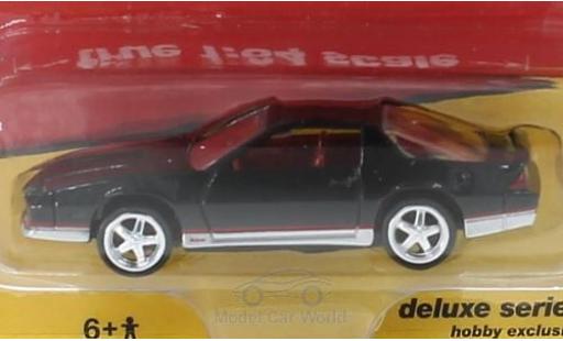 Chevrolet Camaro 1/64 Auto World negro 1984 coche miniatura