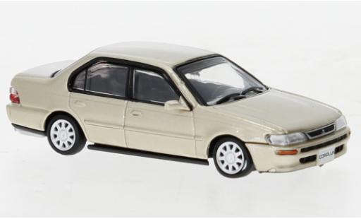 Toyota Corolla 1/64 BM Creations (AE100) metallise beige 1996 coche miniatura