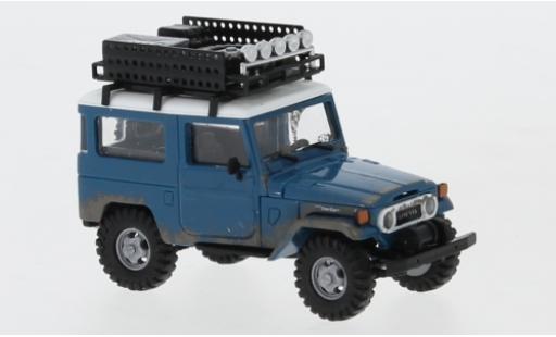 Coche miniatura Toyota Land Cruiser 1/87 Busch J4 azul/blanco 1960 avec Rack de toit et traces d Offroad Toyota Land Cruiser 1/87 Busch J4 azul/blanco 1960 avec Rack de toit et traces d Offroad coche miniatura