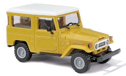 Coche miniatura Toyota Land Cruiser 1/87 Busch J4 amarillo/blanco 1960 Toyota Land Cruiser 1/87 Busch J4 amarillo/blanco 1960 coche miniatura