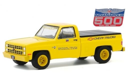 Chevrolet Silverado 1/64 Greenlight amarillo/Dekor Official Truck 1986 70th Annual Indianapolis 500 Mile Race coche miniatura