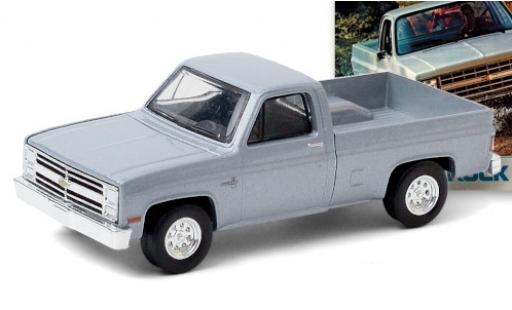 Chevrolet Silverado 1/64 Greenlight metalico gris 1985 coche miniatura