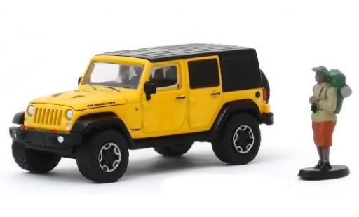 Jeep Wrangler 1/64 Greenlight Unlimited Rubicon Hard Rock amarillo/negro 2015 mit Backpackerfigur coche miniatura