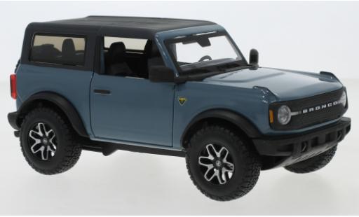 Coche miniatura Ford Bronco 1/24 Maisto Badlands azul/matt-negro 2021 Ford Bronco 1/24 Maisto Badlands azul/matt-negro 2021 coche miniatura