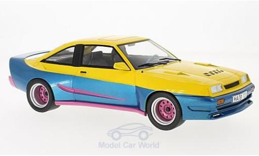 Opel Manta B 1/18 MCG B Mattig amarillo/azul 1991 coche miniatura