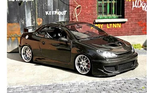 Peugeot 206 CC 1/18 Solido carbon covered coche miniatura