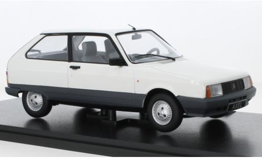 Citroen AX 1/18 Triple 9 Collection Axel 12 TRS blanche 1990 coche miniatura